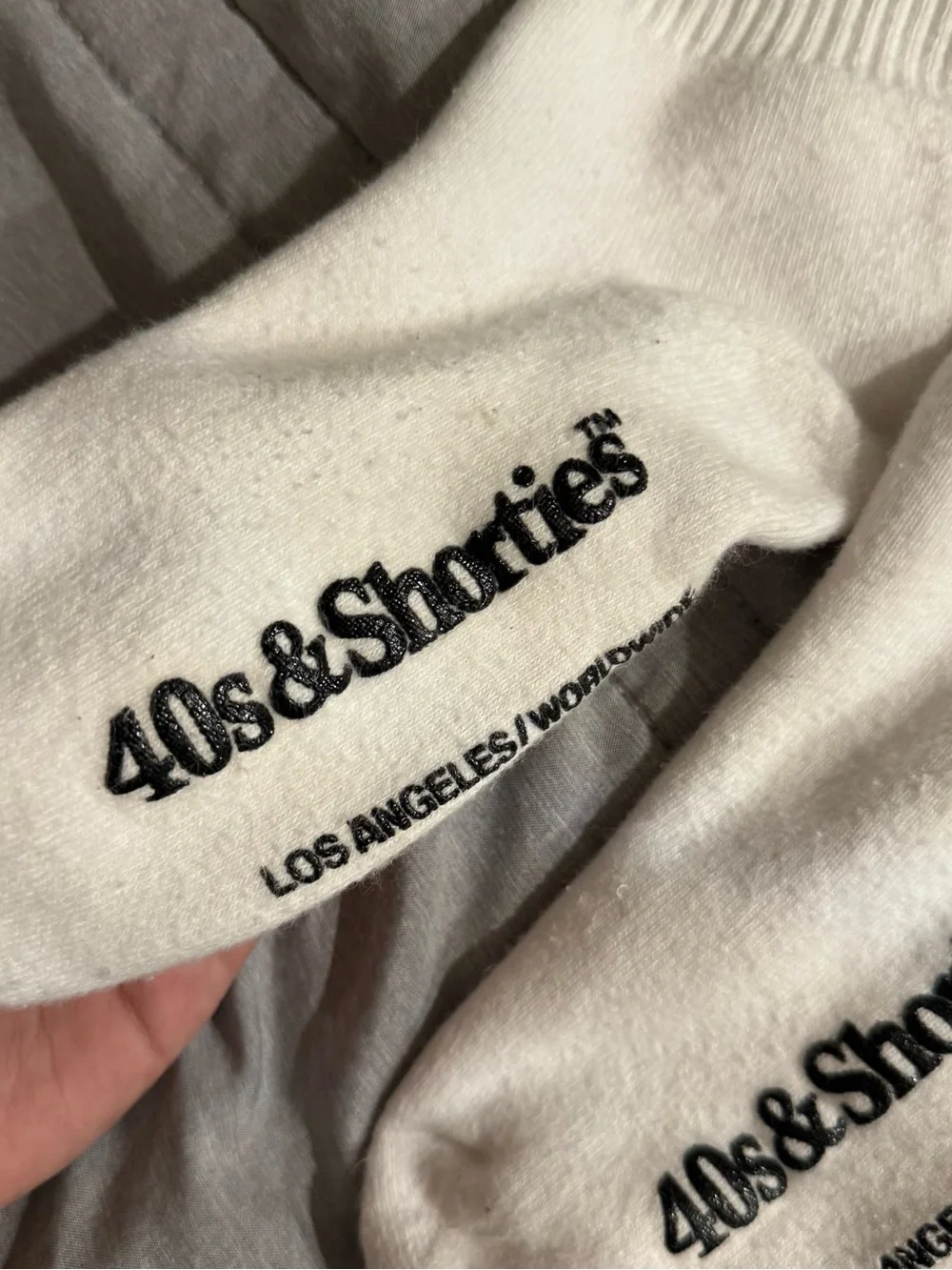 40s & Shorties white crew socks featuring a printed 